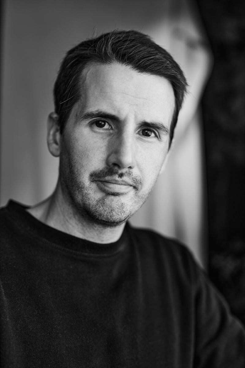 Black-and-white portrait of Dan Pearce